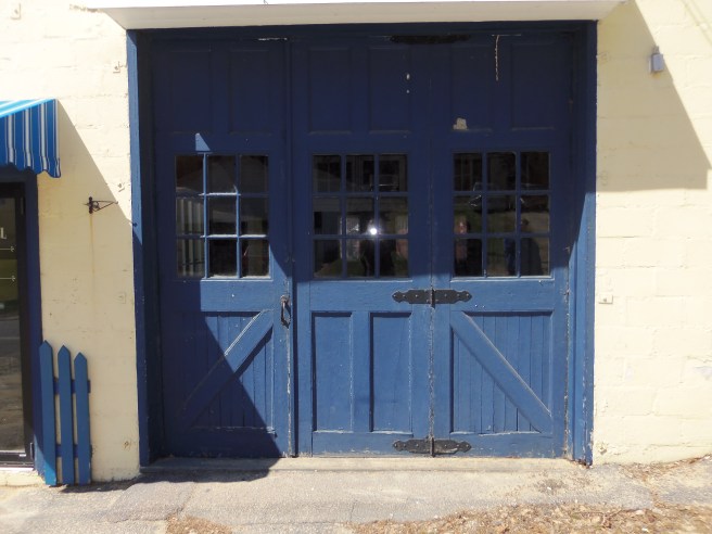 Sometimes a door holds its own drama. It could be the curtain about to go up on the actors.