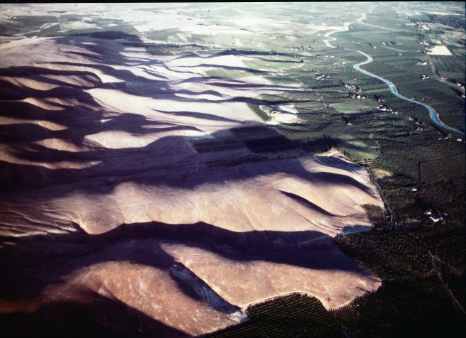Aerial view of the desert ridge behind our the tenant shack where we where living when Mount St. Helens erupted. This is as green as it gets. The orchards are in the irrigated band close to the river.