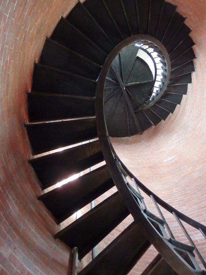 These stairs spiral to the beacon of the lighthouse in Chatham on Cape Cod. 