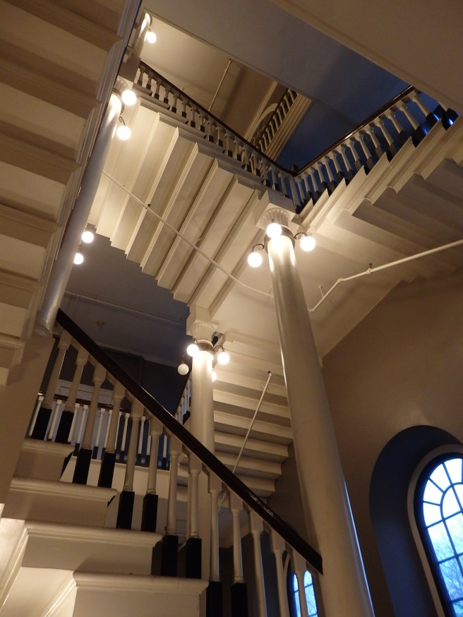 Reaching for the top of the hall.