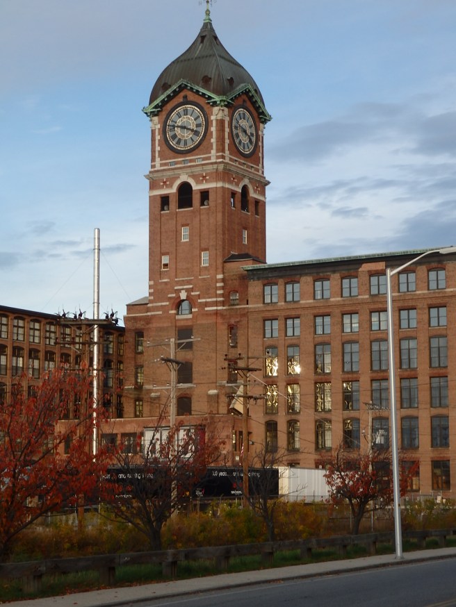 The clock tower of the Ayer Mill in Lawrence, Massachusetts, overlooks the Merrimack River on the other side of the wing to the left. It's an impressive sight. 
