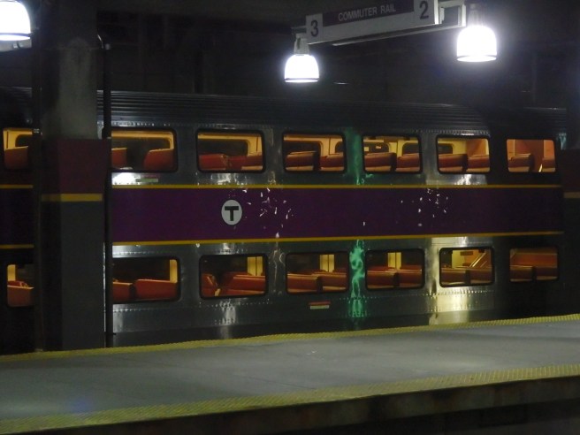 A Purple Line doubledecker awaits departure. 